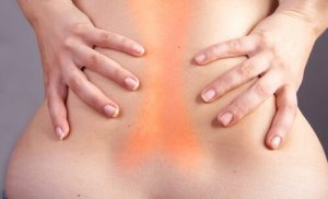 Kramp i ryggen: Orsaker och huskurer