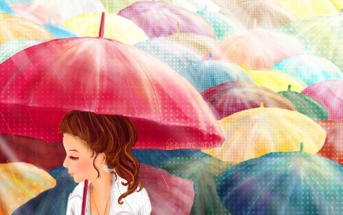 Färgglada paraplyn för molniga dagar
