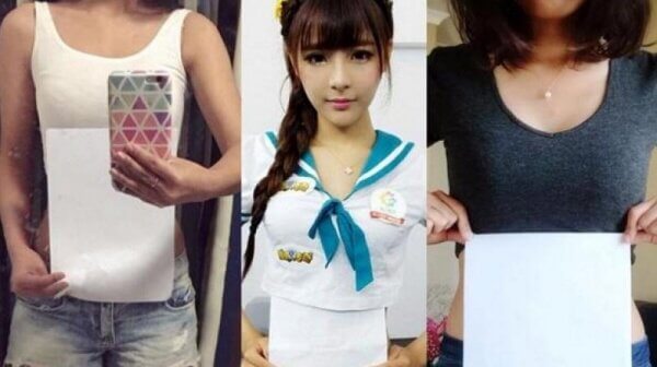 personer som håller upp papper framför magen