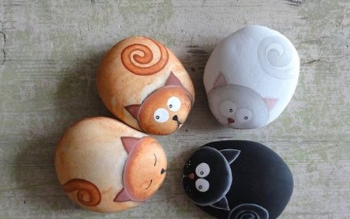 djurstenar- katter målade på stenar