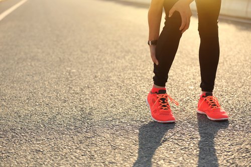 Löpare med kramp i vaden