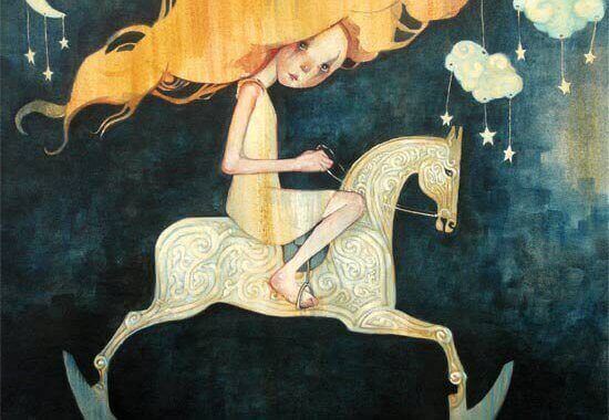 barn som rider på en gunghäst