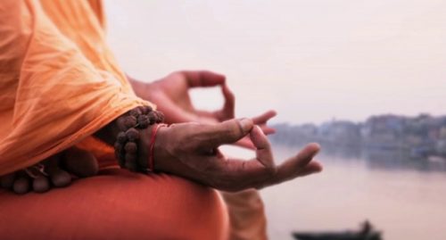 Händer i meditationsposition