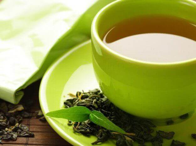 Kopp med grönt te