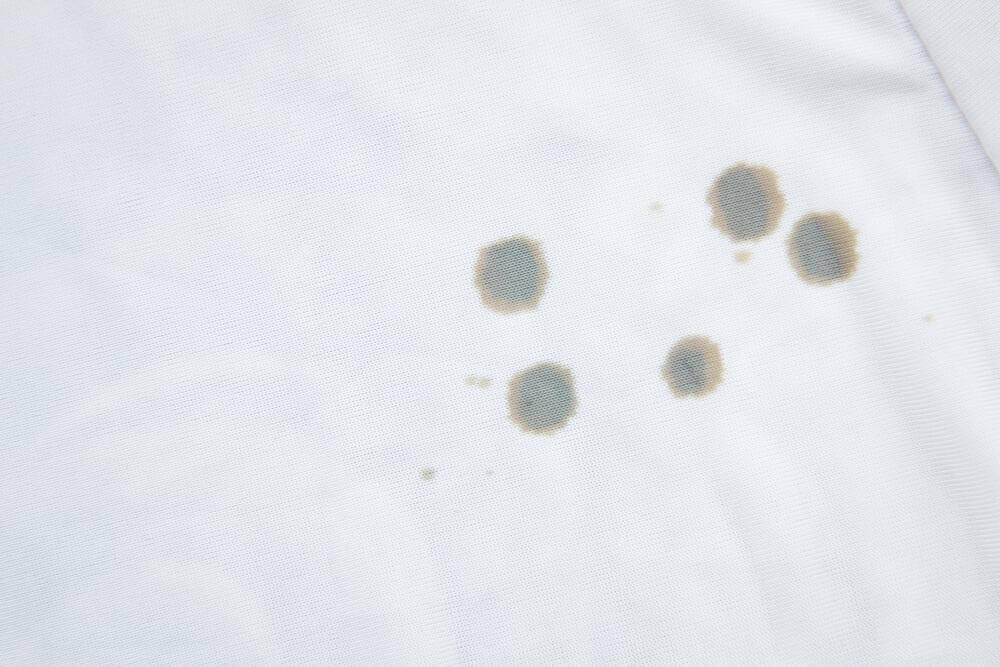 Oljefläckar på kläderna