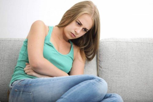 Illamående kvinna