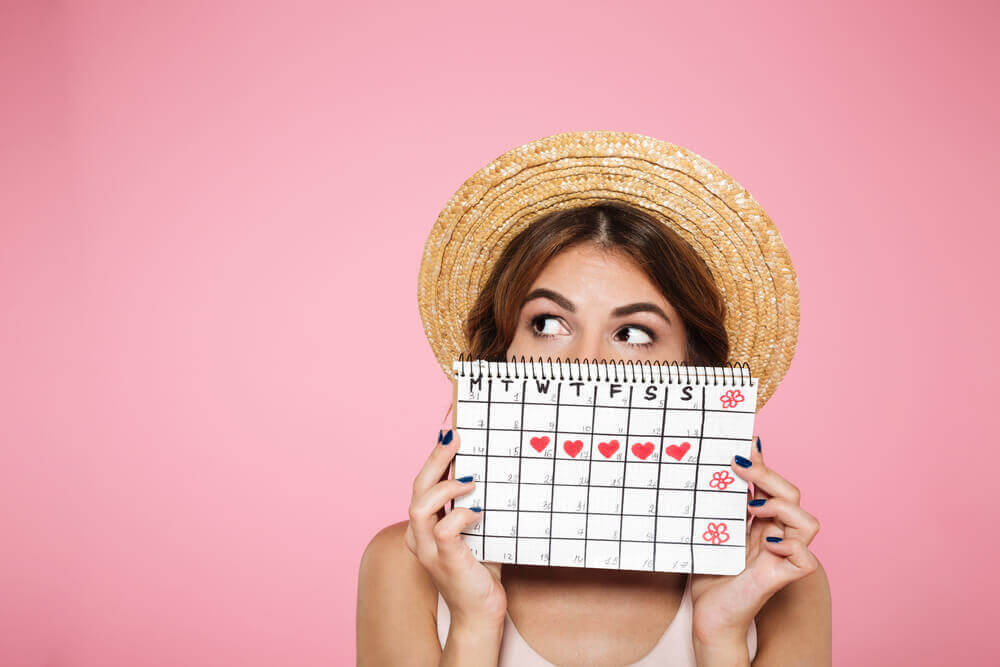 kvinna med kalender