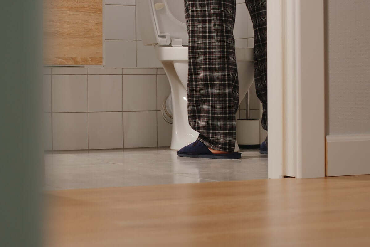 man på toalett