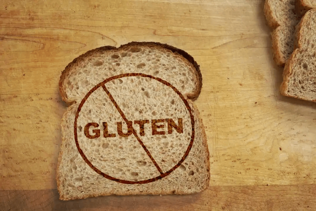 brödskiva med överstruket gluten skrivet på