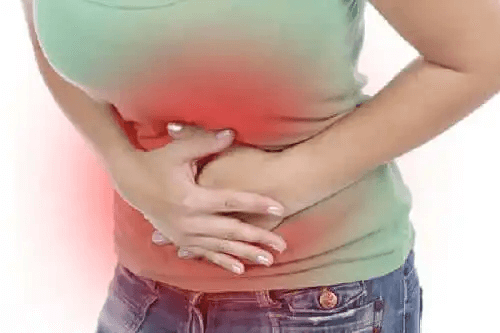 En kvinna med ont i magen