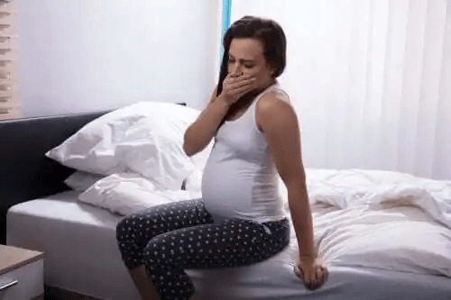symptomen på en graviditet: illamående