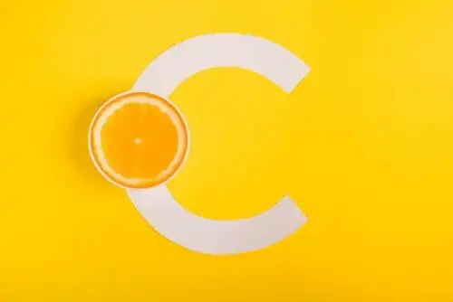 vitamin C-logga med en apelsin